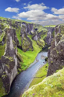 Deserted European Landscape Drucke: Steep vertical cliffs surround the stream of very cold water
