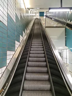 Deserted Subway Station Drucke: Empty steps of an escalator in a perspective view
