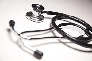 Deserted Hospital Scene Drucke: Stethoscope on gradated background with selective focus