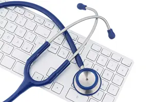 Austria Healthcare System Drucke: Stethoscope and keyboard of a computer