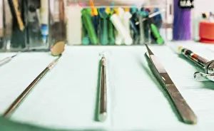 Healthcare Professional Tools Drucke: Stomatologist tools close-up on table