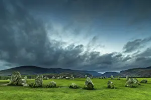 Atmospheric Landscape Photography Europe Drucke: Stone circle with dramatic clouds