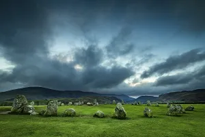 Atmospheric European Landscape Drucke: Stone circle with dramatic clouds