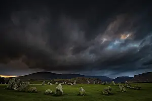 British National Park Landscapes Drucke: Stone circle with dramatic dark cloud sky