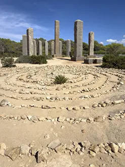 Balearic Islands Monument Drucke: Stone column formation and circular patterns in arid landscape
