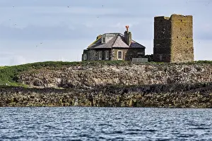 Uninhabited Coastal Structure Drucke: Stone house and former lighthouse