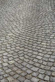 Cobblestone Background Drucke: Stone paving texture. Abstract structured background