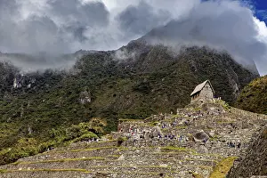 Cloudy Mountain Landscape Photography Drucke: Stone structures on steep terraces in front of a cloudy mountain