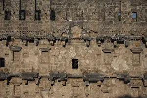 Historic Building Elements Drucke: Part of the stone wall of the ancient amphitheater with architectural elements