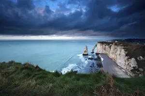 Rocky Shoreline Europe Drucke: Storm over cliffs in Atlantic ocean