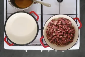 Kitchen Design Drucke: A stove is set up in a kitchen with two pots