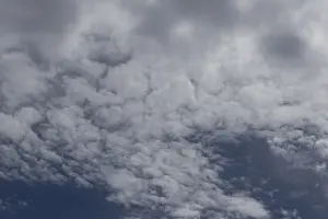 Stratocumulus Clouds Drucke: Stratocumulus white clouds in a blue sky