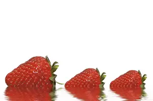 Fruity Food Still Life Drucke: Three strawberries with their reflections