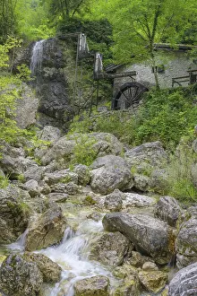 European Countryside Landscape Shot Drucke: Stream, mill wheel and waterfall at the old mill