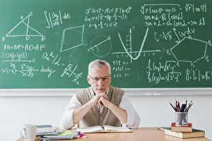 Educational Institution Photography Drucke: Strict teacher looking camera classroom
