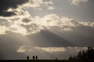 East German Scenery Drucke: Stroller, sunbeams breaking through clouds