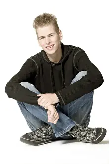White Background Male Model Drucke: Studio portrait of a young man smiling