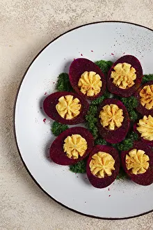 Stuffed Eggs Drucke: Stuffed eggs, stained with beetroot juice