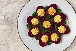Stuffed Eggs Drucke: Stuffed eggs, stained with beetroot juice