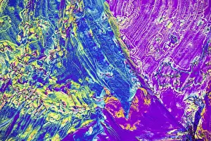 Colorful Crystal Structures Drucke: A stunning microscopic view of microcrystals showcasing a vivid array of colors including blue