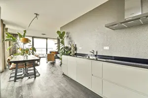 Scandinavian Interior Design Drucke: A stylish dining area featuring a sleek table