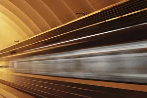 Public Transport Hub Drucke: Subway platform with moving fast train