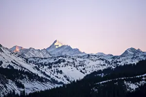 Austria Evening Sky Drucke: Summit of Grossglockner at sunset in winter