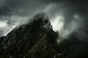 Bernese Oberland Mountains Drucke: Summit ridge with dramatic clouds