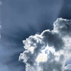 Square Format Photography Drucke: Sun behind clouds