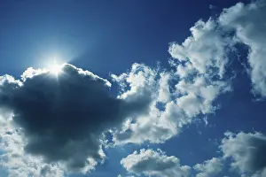 Cloud Formations In The Sky Drucke: Sun behind clouds