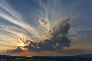 Overcast European Sky Drucke: Sun and clouds in the evening sky