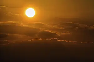 German North Sea Coast Drucke: Sun above clouds, evening sky, Sylt