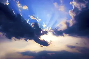 Deserted Landscape Photos Drucke: Sun behind clouds and sun beams