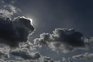 Western Europe Weather Drucke: Sun hidden under dark clouds. Bas-Rhin