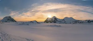 Remote Wilderness Exploration Drucke: The sun sets behind the rugged