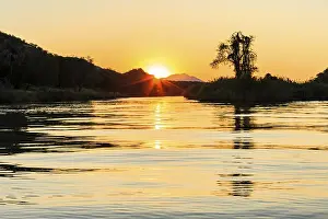 Travel Photography Namibia Drucke: Last Sunbeams, Sunset over the Kunene