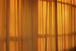 Red Curtain Interior Drucke: Sunlight behind a curtain