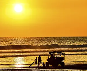Coastal Evening Light Drucke: Sunset on beach