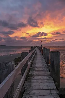 Wooden Bridge Germany Drucke: Sunset on the beach of Utersum