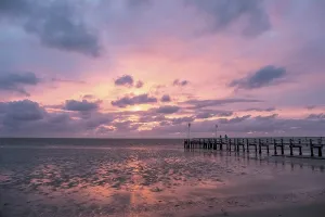 Wooden Bridge Germany Drucke: Sunset on the beach of Utersum