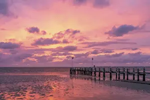 Wooden Bridge Germany Drucke: Sunset on the beach of Utersum