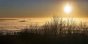 Cloudy Evening Sky Germany Drucke: Sunset over cloud cover, wind turbines