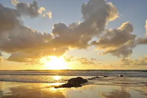 Cloudy Sky Reflections Drucke: Sunset and clouded sky reflected in the Atlantic Ocean