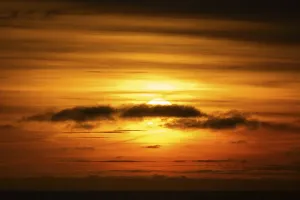 Uninhabited Coastal Landscape Drucke: Sunset behind clouds, Baltic Sea