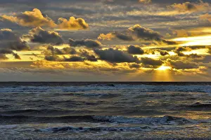 Sunset On The North Sea Drucke: Sunset with clouds on the beach