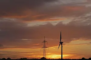 Renewable Energy Source Germany Drucke: Sunset, clouds, high-voltage pylon