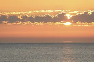 North Sea Sunset Drucke: Sunset with clouds over the North Sea