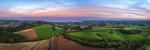 Atmospheric Drone Image UK Drucke: Sunset of Devon Farms and Fields over Berry Pomeroy from a drone