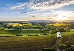 Evening Light Landscape Photo Drucke: Sunset over Devon Windmill from a drone