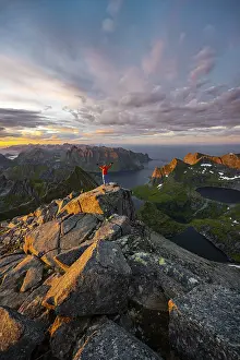 Norway Coastal Scenery Drucke: Sunset with dramatic clouds, view from the top of Hermannsdalstinden